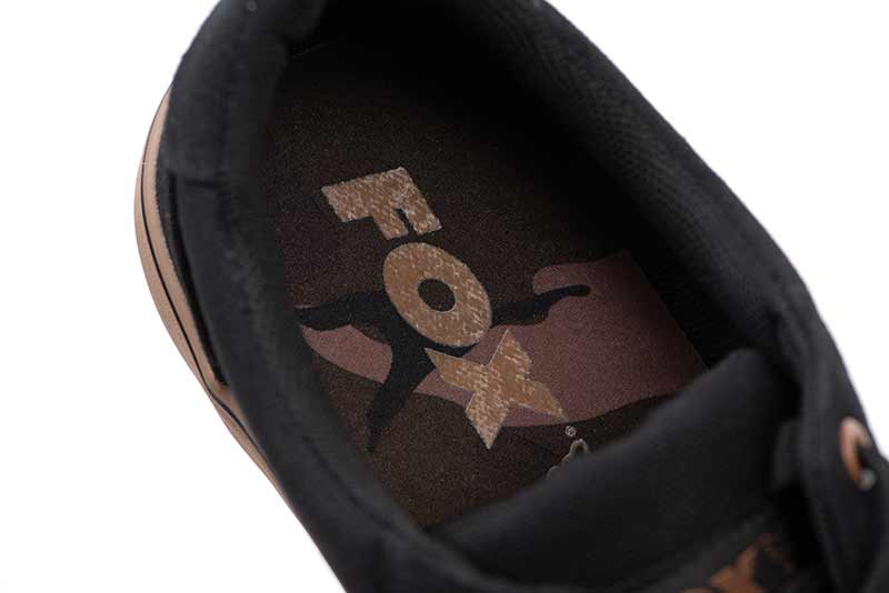 Interior view of Fox Canvas Black sneakers showing logo and cushioned insole design.